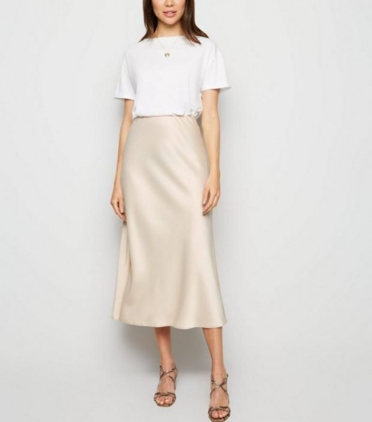 Бесподобные летние юбки 2022 2023 года: модные тенденции на фото