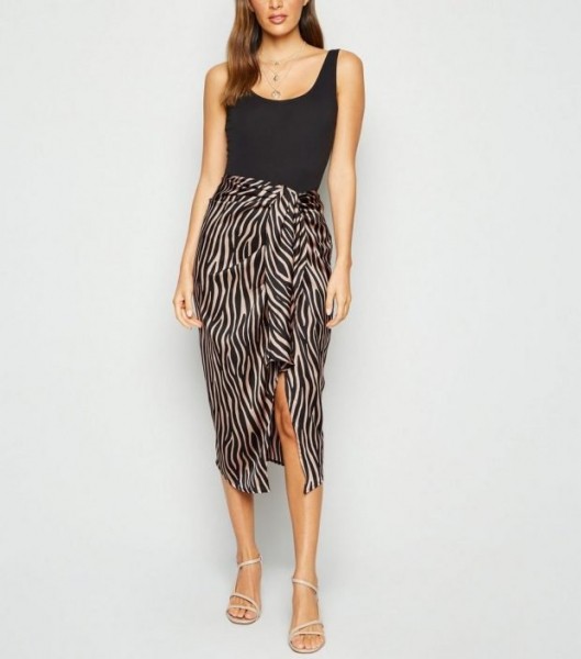 Бесподобные летние юбки 2022 2023 года: модные тенденции на фото